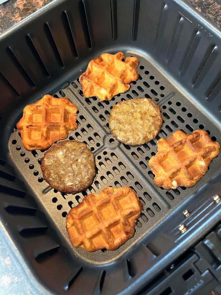 Golden brown Swaggerty's Farm Sausage Waffle Sandwiches cooking in the air fryer.