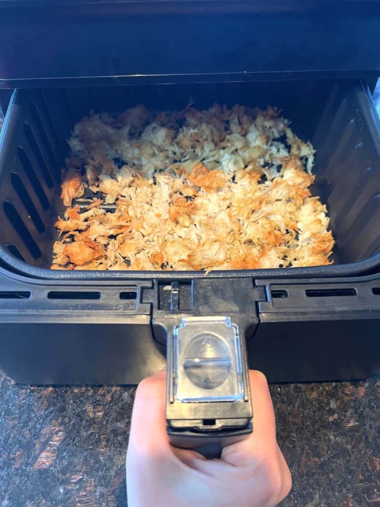 Crispy shaved chicken breast fresh out of the air fryer—perfectly browned and ready to serve.