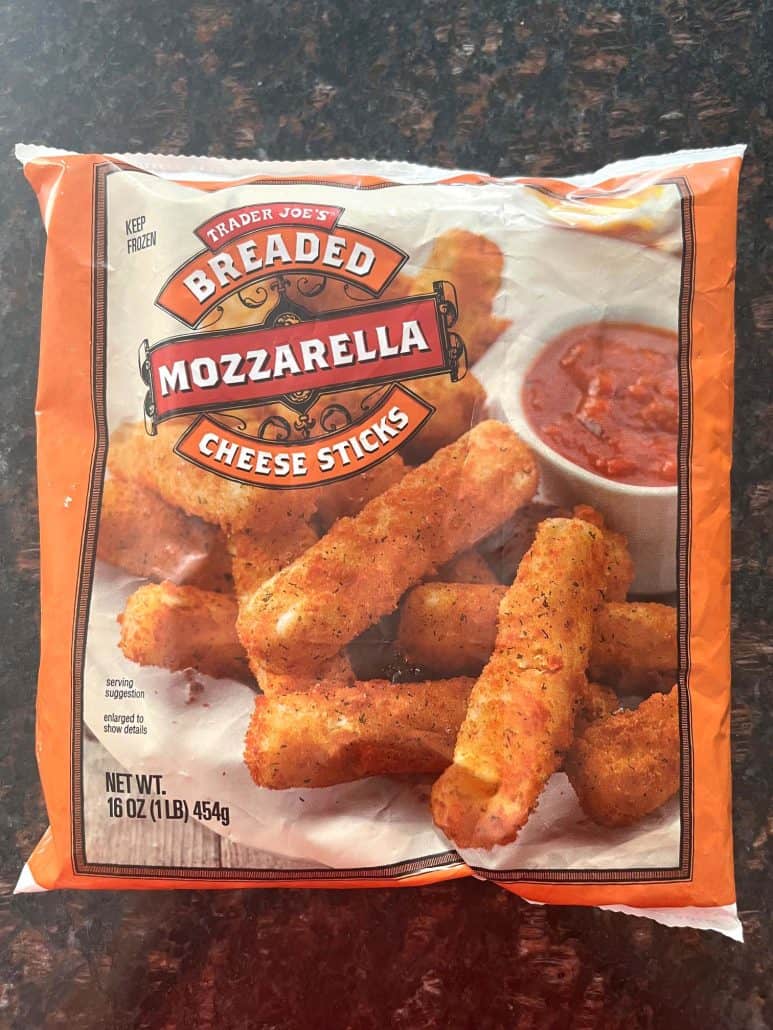 Bag of Trader Joe’s Breaded Mozzarella Cheese Sticks, ready to be cooked in the air fryer.