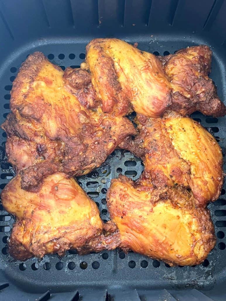 Golden brown and crispy Trader Joe’s shawarma chicken thighs cooked in the air fryer, shown fresh and ready to serve.