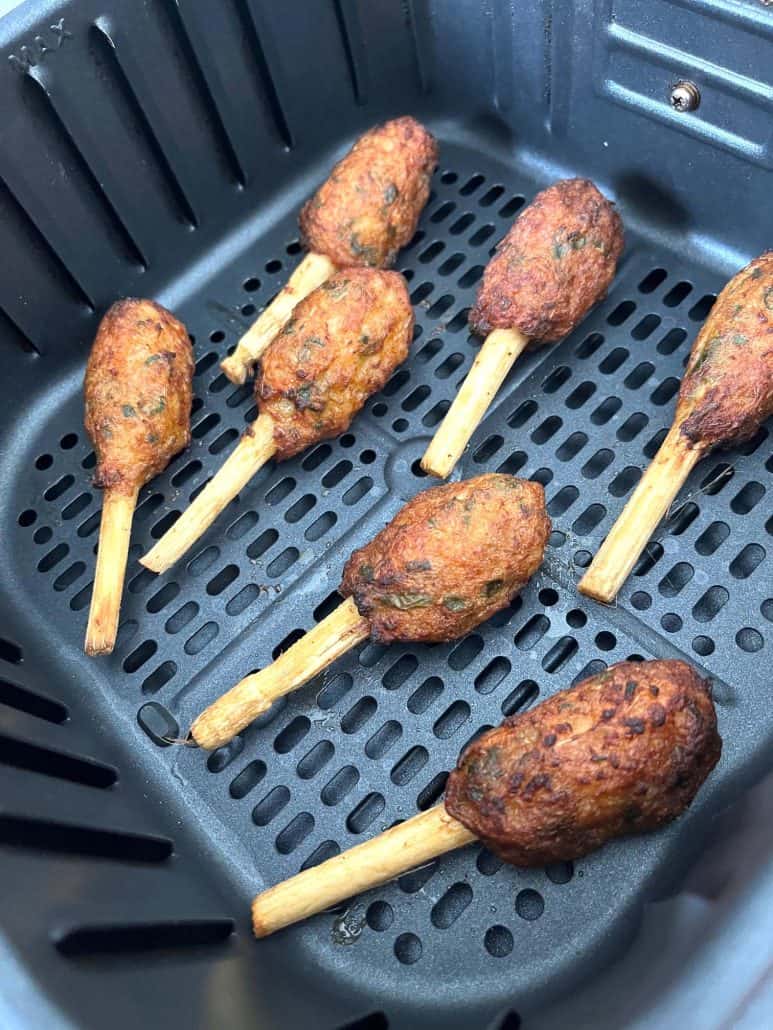 Crispy cooked Trader Joe’s Chao Tom in the air fryer basket, showing the perfect texture from air frying.