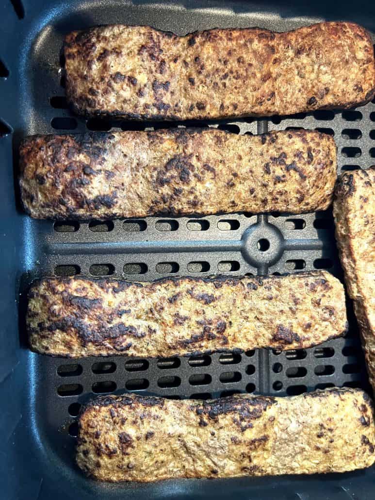 Close-up of crispy, browned Trader Joe’s beef kabobs in the air fryer, cooked to perfection and ready to serve.