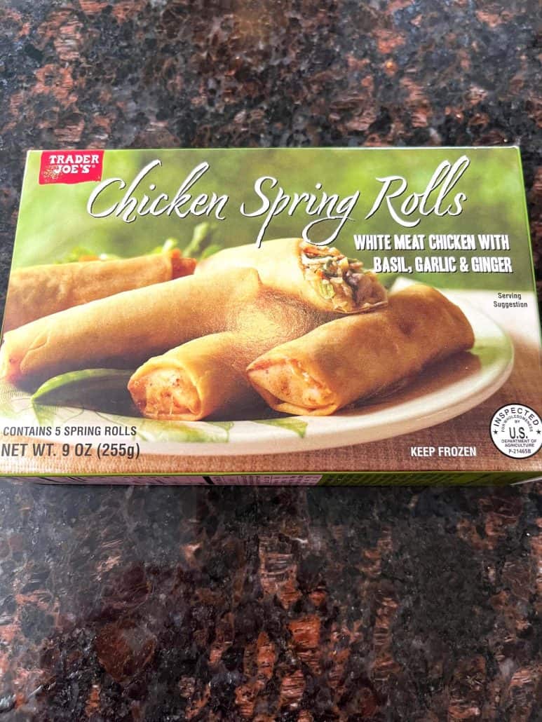 Box of Trader Joe’s Chicken Spring Rolls shown on the counter—these are the frozen spring rolls cooked to crispy perfection in the air fryer.