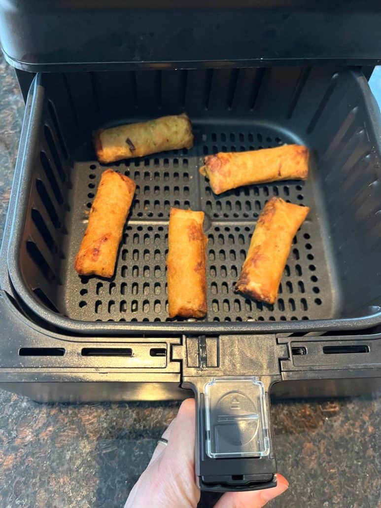 Crispy Trader Joe’s spring rolls perfectly cooked in the air fryer basket—ready to serve hot and crunchy straight from frozen.