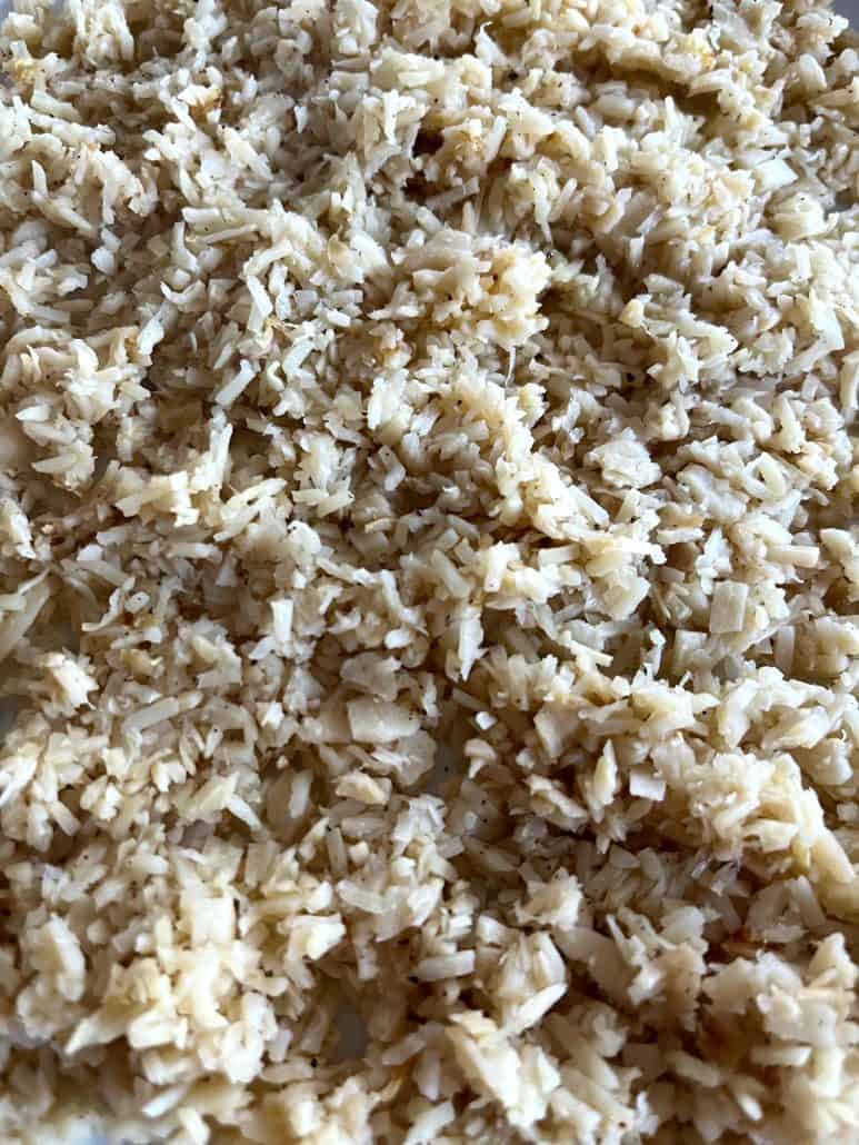 Extreme close-up of cooked hearts of palm rice showing its fluffy, rice-like texture – a delicious and healthy low-carb alternative.