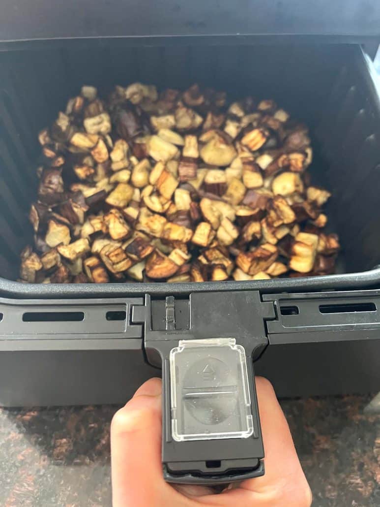 Golden, crispy graffiti eggplant fresh out of the air fryer, perfectly roasted.