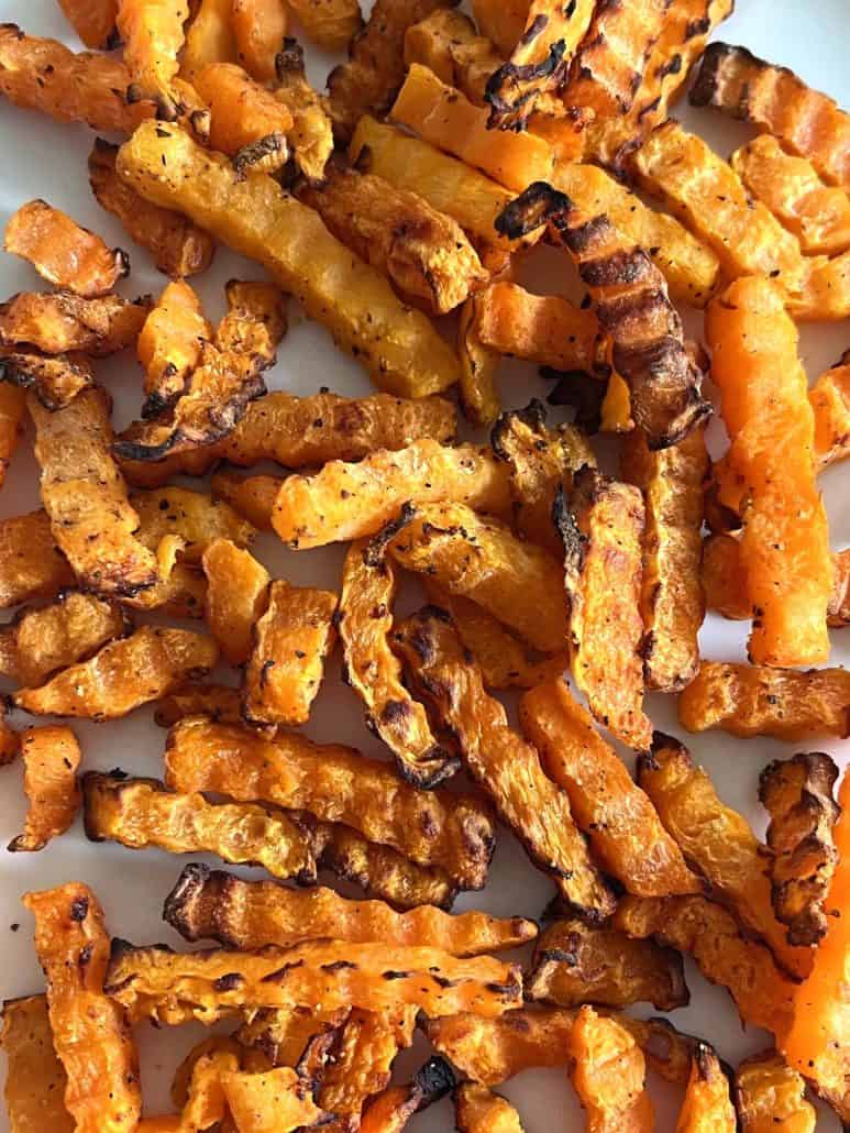 Close-up of crispy, golden Trader Joe’s Butternut Squash Zig-Zags after air frying, highlighting their perfect texture and caramelized edges.