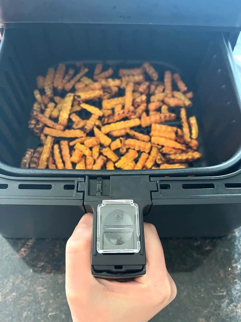 Air fryer filled with freshly cooked Trader Joe’s Butternut Squash Zig-Zags, perfectly golden.