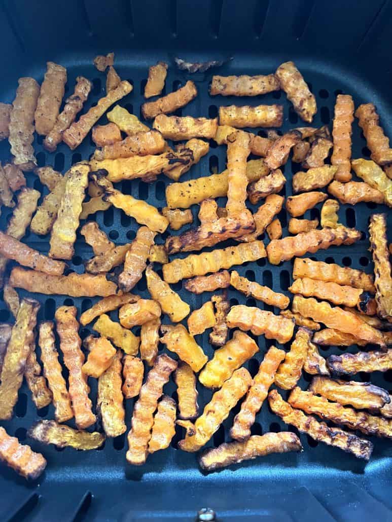 Close-up view of air-fried Trader Joe’s Butternut Squash Zig-Zags, showing their crisp, golden texture.