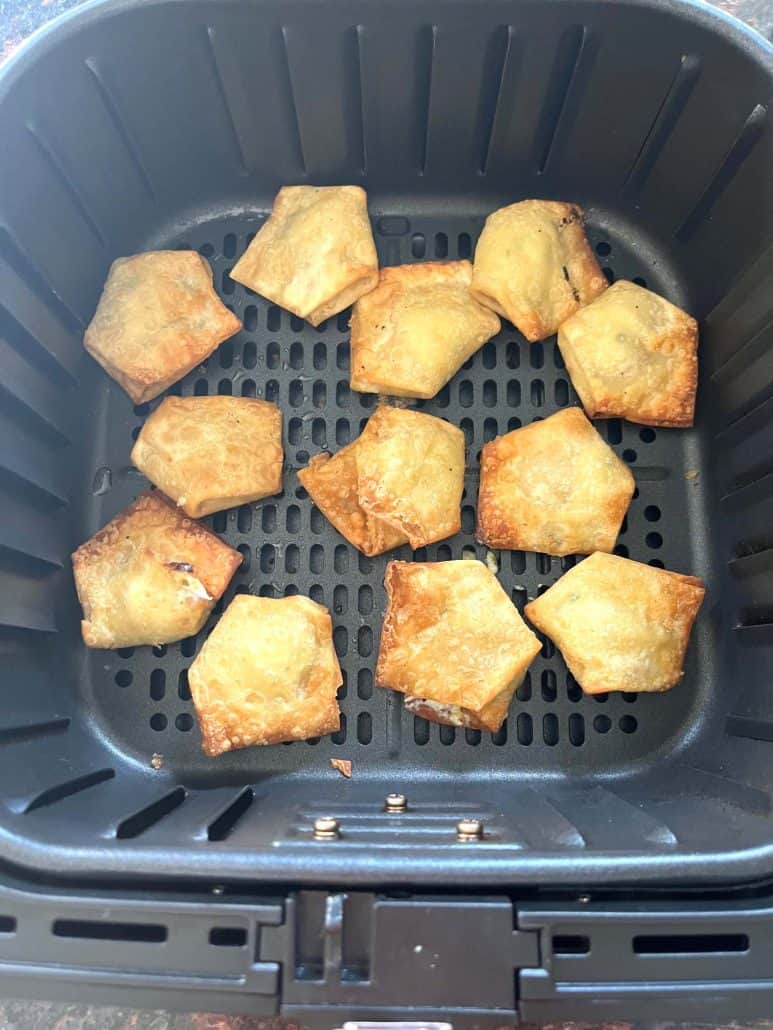 Top-down view of crispy Trader Joe’s wontons freshly air fried and ready to serve.