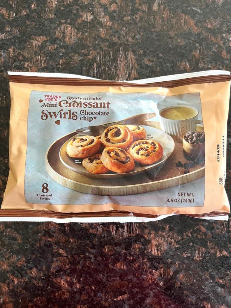 Package of Trader Joe’s Mini Croissants, showcasing the frozen product with a picture of the croissants on the front, perfect for air fryer baking.