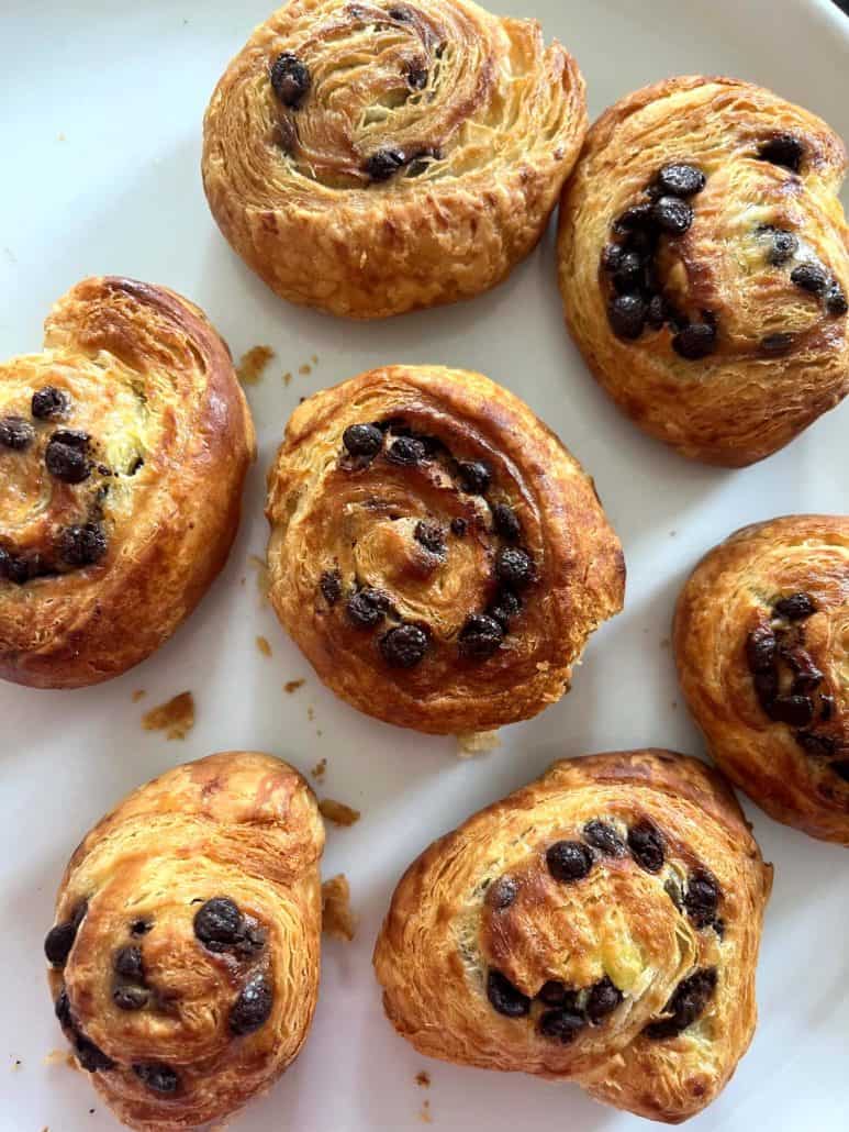 Close-up of freshly baked Trader Joe’s Mini Croissants on a plate, golden and flaky.