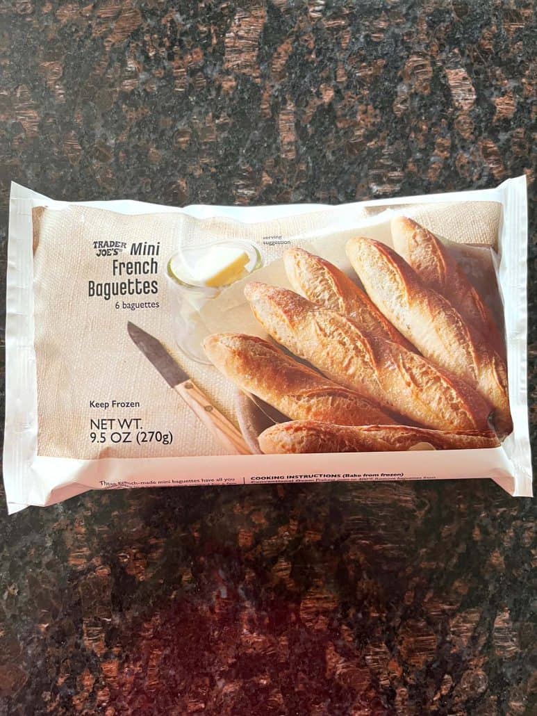Package of Trader Joe’s frozen mini French baguettes shown before cooking, as featured in the easy air fryer bread recipe.