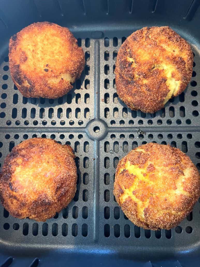 Close-up of crispy Trader Joe’s Papas Rellenas freshly cooked in the air fryer basket.
