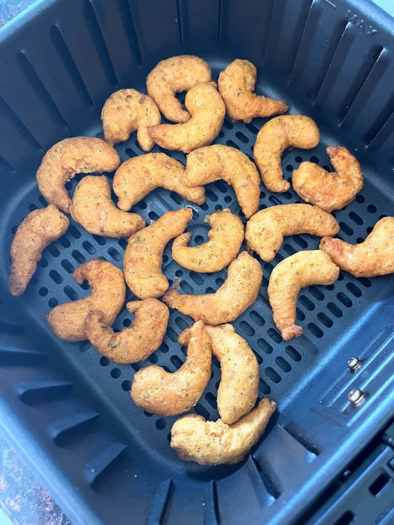Golden crispy Trader Joe’s Shrimp Boom Bah freshly cooked in the air fryer basket.