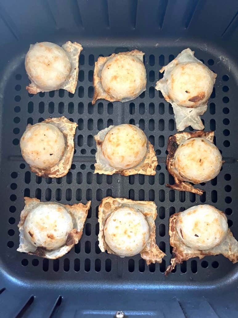 Top-down view of air-fried Trader Joe’s Thai Coconut Pancakes (Kanom Krok), perfectly golden and crispy.