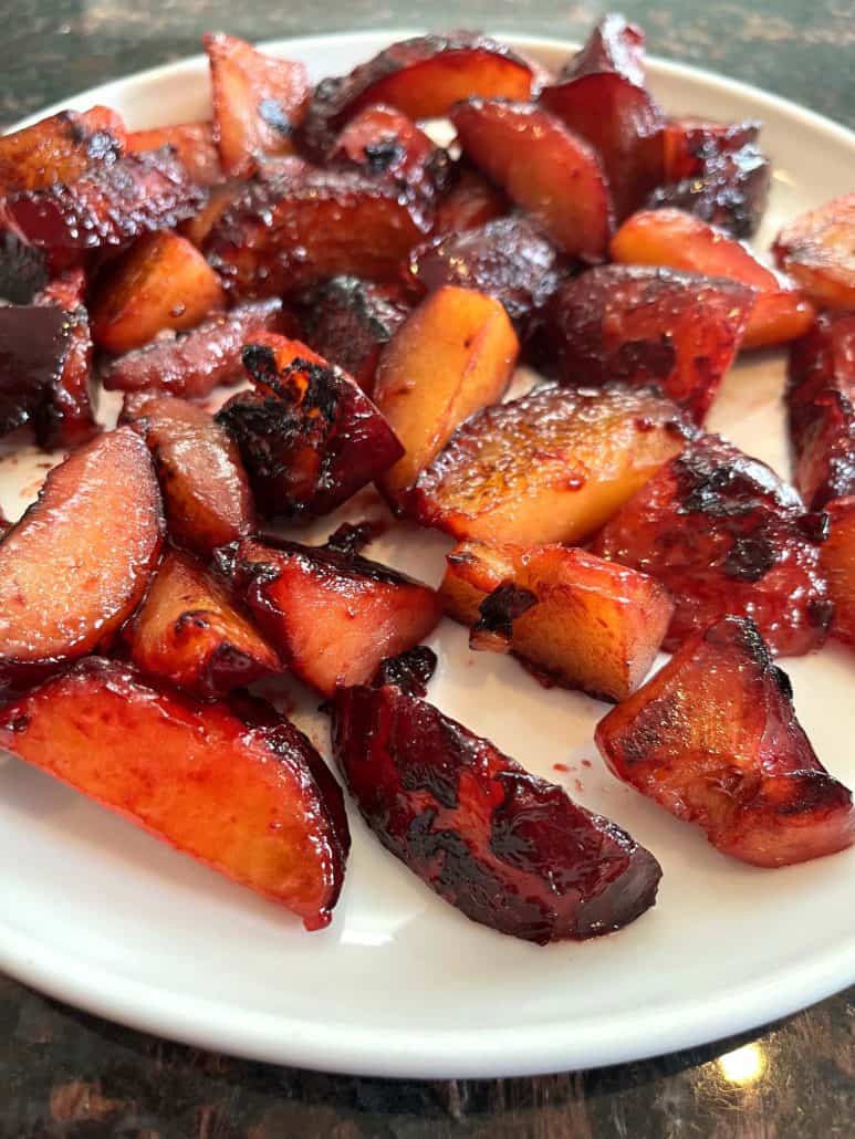 Plated caramelized plums served warm, showcasing the final result of the Sauteed Plums Recipe.