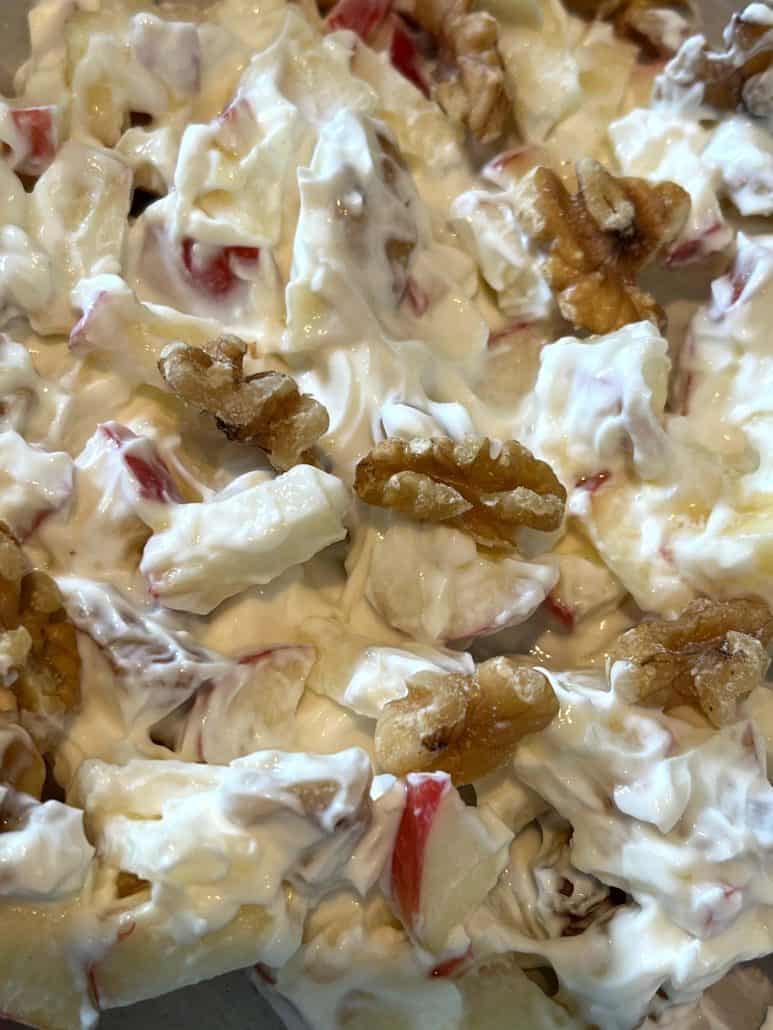 Close-up of the Skyr bowl mixture showing creamy yogurt, chopped apples, and walnuts—highlighting the texture and wholesome ingredients of this no-cook breakfast recipe.
