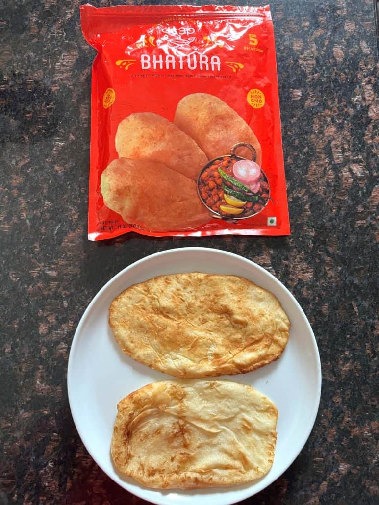Cooked bhatura served on a white plate with the frozen packaging shown above—demonstrating the easy air fryer method from freezer to table.