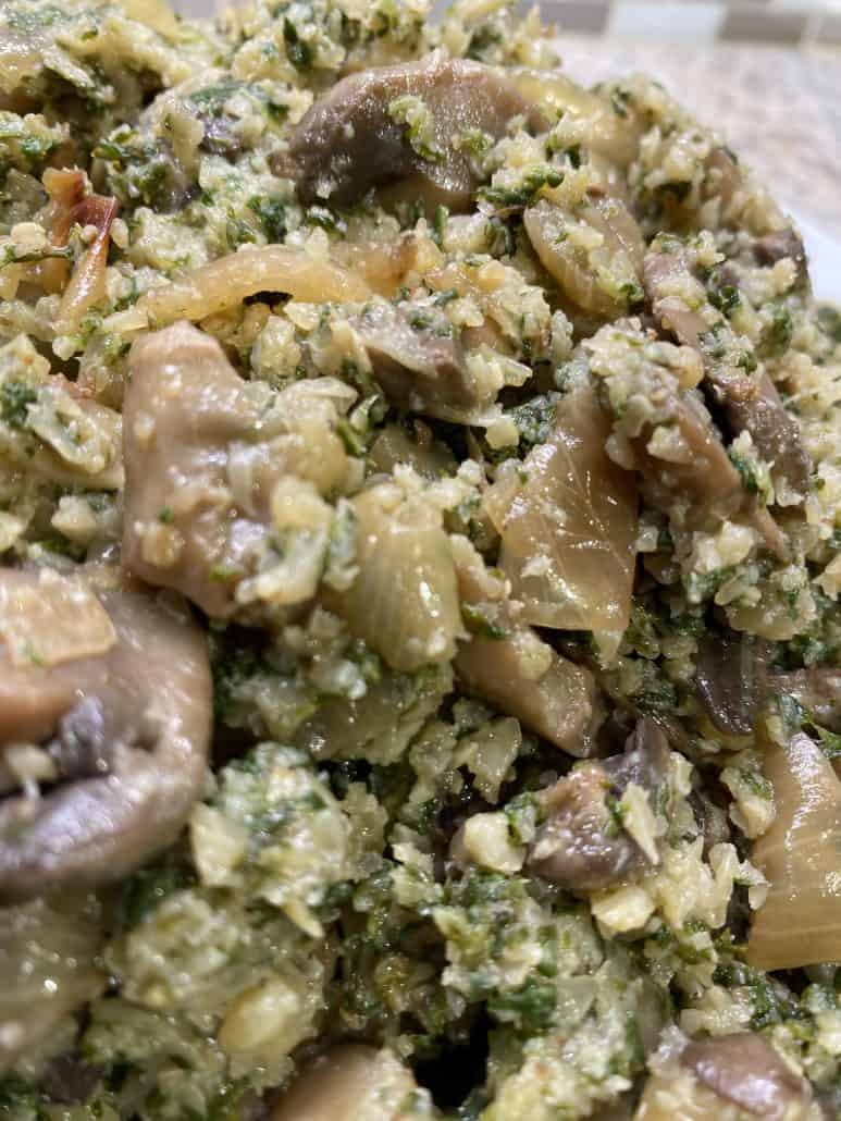 Ultra close-up of Mustard Greens with Mushrooms and Cauliflower Rice – showcasing the tender mushrooms, fluffy cauliflower, and vibrant greens in this hearty low-carb dish.