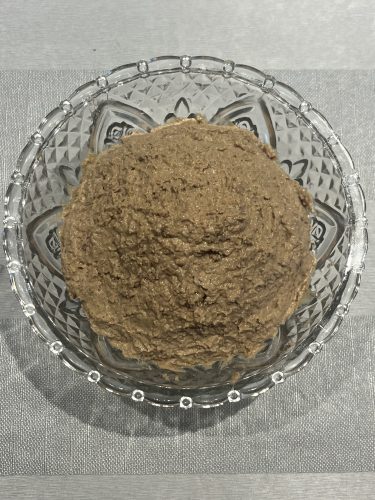 Rich and Creamy Chopped Liver Recipe Bowl of creamy chopped liver spread made from sautéed onions and calf liver, ready to serve as a traditional Jewish appetizer.