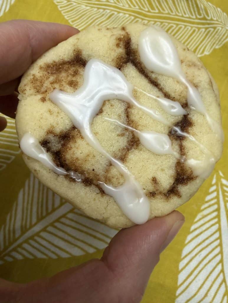 Close-up of a single No Chill Cinnamon Roll Cookie with icing.