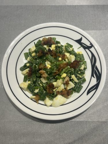Protein-Packed Green Onion Egg and Bacon Salad Recipe Overhead view of Green Onion, Egg, and Bacon Salad served on a white plate — a simple, flavorful low-carb recipe featured in this post.