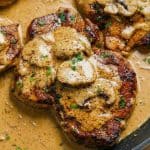 Close-up of tender pork chops in creamy mushroom sauce, as featured in the Mushroom Pork Chops stovetop recipe.