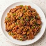 Cajun sausage and rice skillet served in a bowl, showcasing a flavorful one-pan dinner.