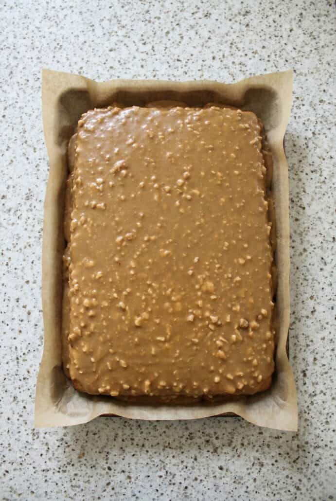Peanut butter sheet cake topped with creamy peanut butter frosting.