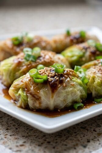 Best Cabbage Dumplings Recipe (Easy & Healthy) Cabbage dumplings filled with chicken and vegetables, served with soy sauce and chili oil.
