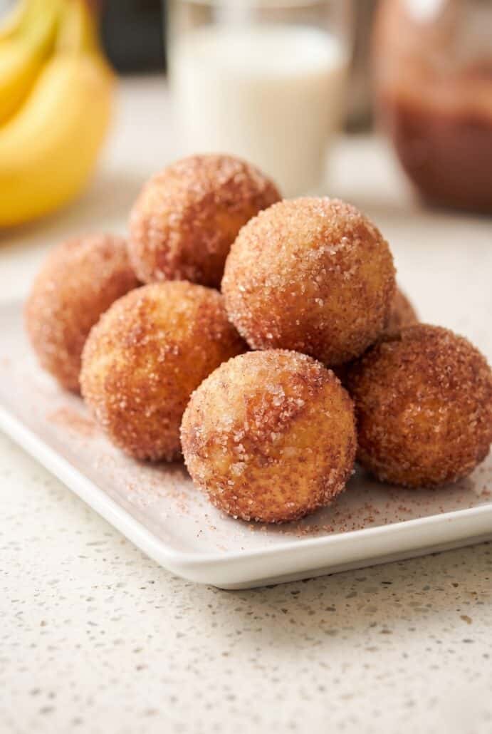 Cinnamon sugar 2-ingredient banana donut holes cooked in the air fryer.