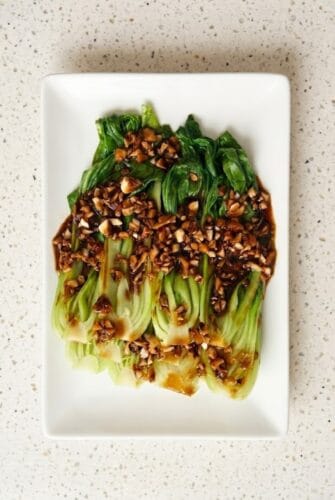 Easy Bok Choy Recipe With Garlic Soy Sauce Bok choy with garlic soy sauce served on a plate.