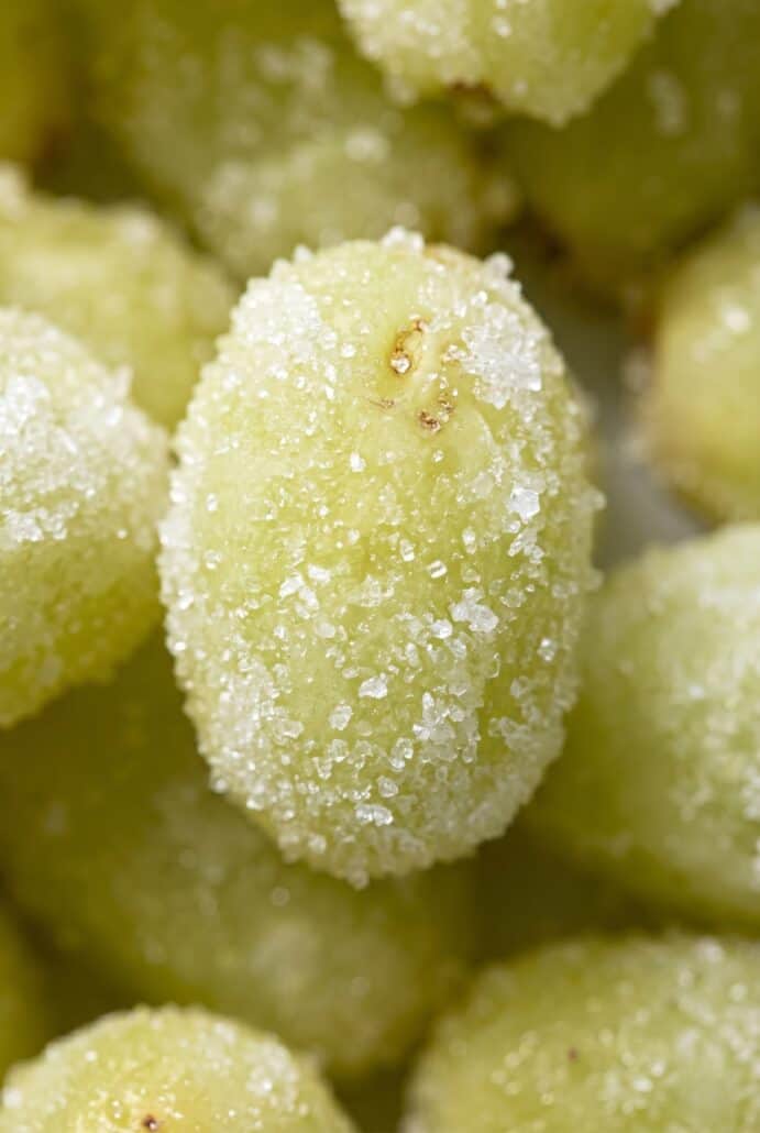 Sugar-coated frozen grapes for easy Sour Patch Grapes snack.