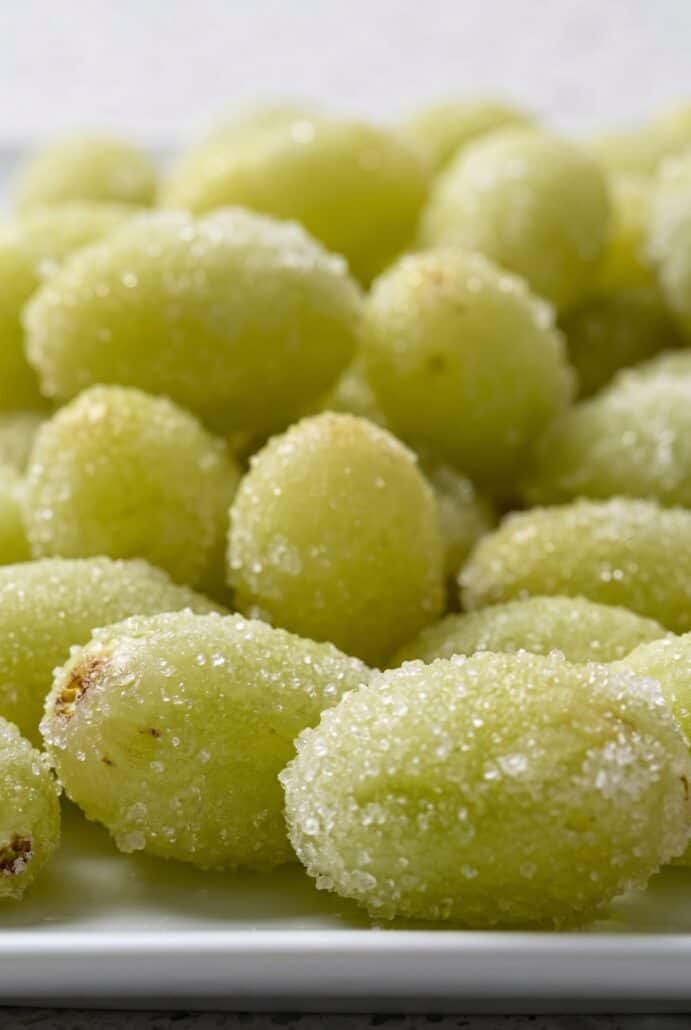 Frozen sugar-coated Sour Patch Grapes with sweet and tangy lime flavor.