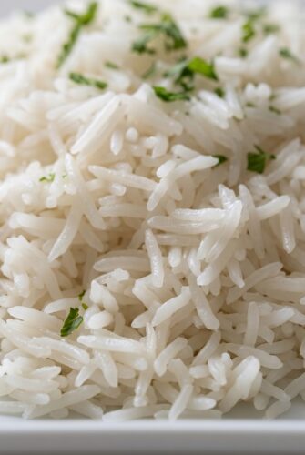 How to Cook Perfect Basmati Rice - Fluffy Every Time! Fluffy basmati rice with long, separate grains.