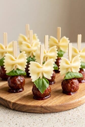 Bowtie Pasta & Cocktail Meatball Skewers (Perfect Party Appetizer!) Bowtie pasta and cocktail meatball skewers with basil for easy party appetizer.
