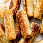 Golden sausage-filled French toast roll-ups for an easy breakfast recipe.