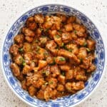Garlic pork stir-fry with tender pork bites coated in a sticky honey garlic sauce.