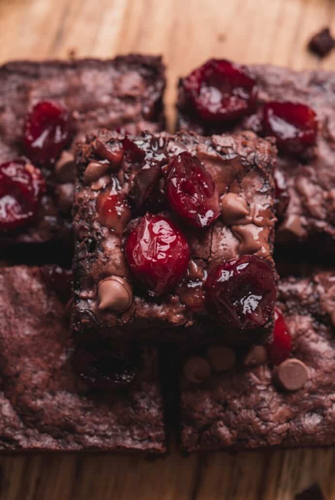 Fudgy roasted cherry brownie topped with juicy cherries and chocolate chips.