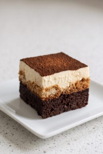 Fudgy Tiramisu Brownies Recipe Tiramisu brownie with fudgy chocolate base, espresso-soaked layer, mascarpone cream, and cocoa topping.