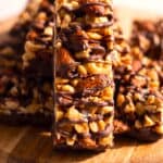 Homemade dark chocolate sea salt nut bars drizzled with melted chocolate.