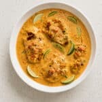 Creamy Cajun chicken served with lime in a rich skillet sauce.