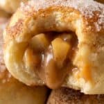 Caramel apple pie bomb with warm cinnamon apple filling and gooey caramel center.