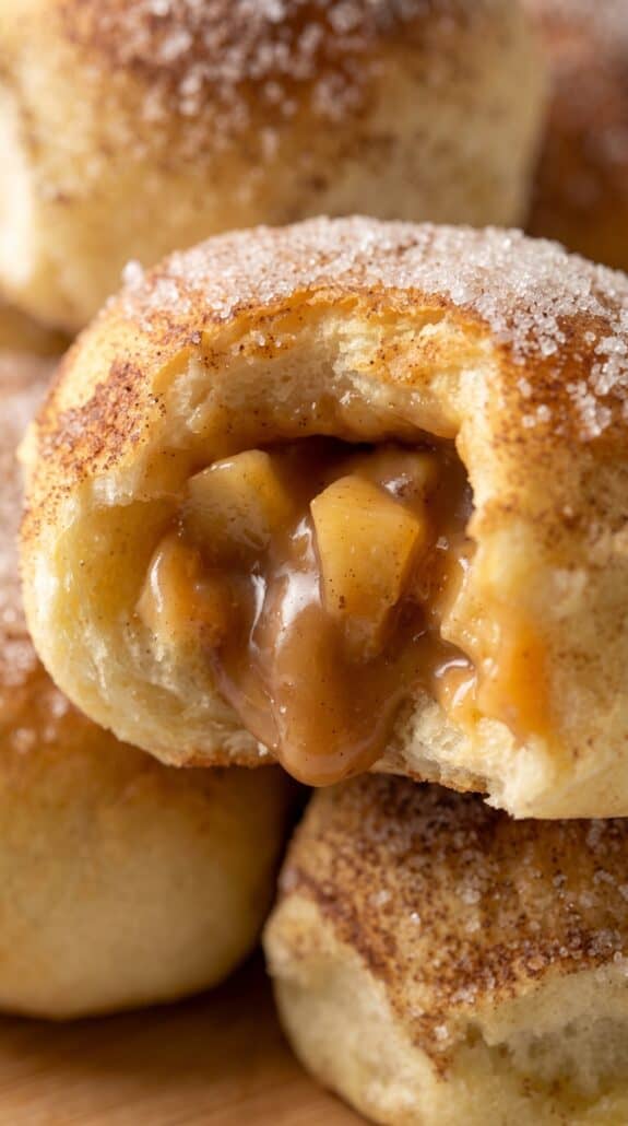 Caramel apple pie bomb with warm cinnamon apple filling and gooey caramel center.
