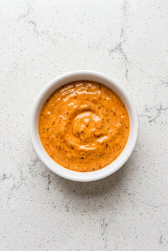 Creamy Chipotle Garlic Sour Cream Sauce in 10 Minutes Creamy homemade chipotle garlic sour cream sauce in a bowl, ideal for tacos, sandwiches, and dipping.