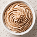 Whipped cinnamon butter in a bowl, ready to spread on toast, pancakes, or warm bread.