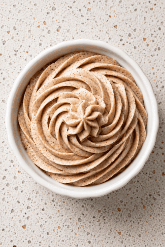 Homemade Cinnamon Butter (Texas Roadhouse Copycat Recipe) Whipped cinnamon butter in a bowl, ready to spread on toast, pancakes, or warm bread.