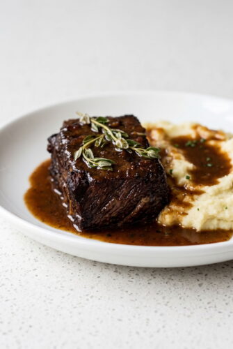 Braised Short Ribs in Red Wine Sauce (Dutch Oven Method) Red wine braised short rib in rich sauce for Dutch oven short ribs recipe.